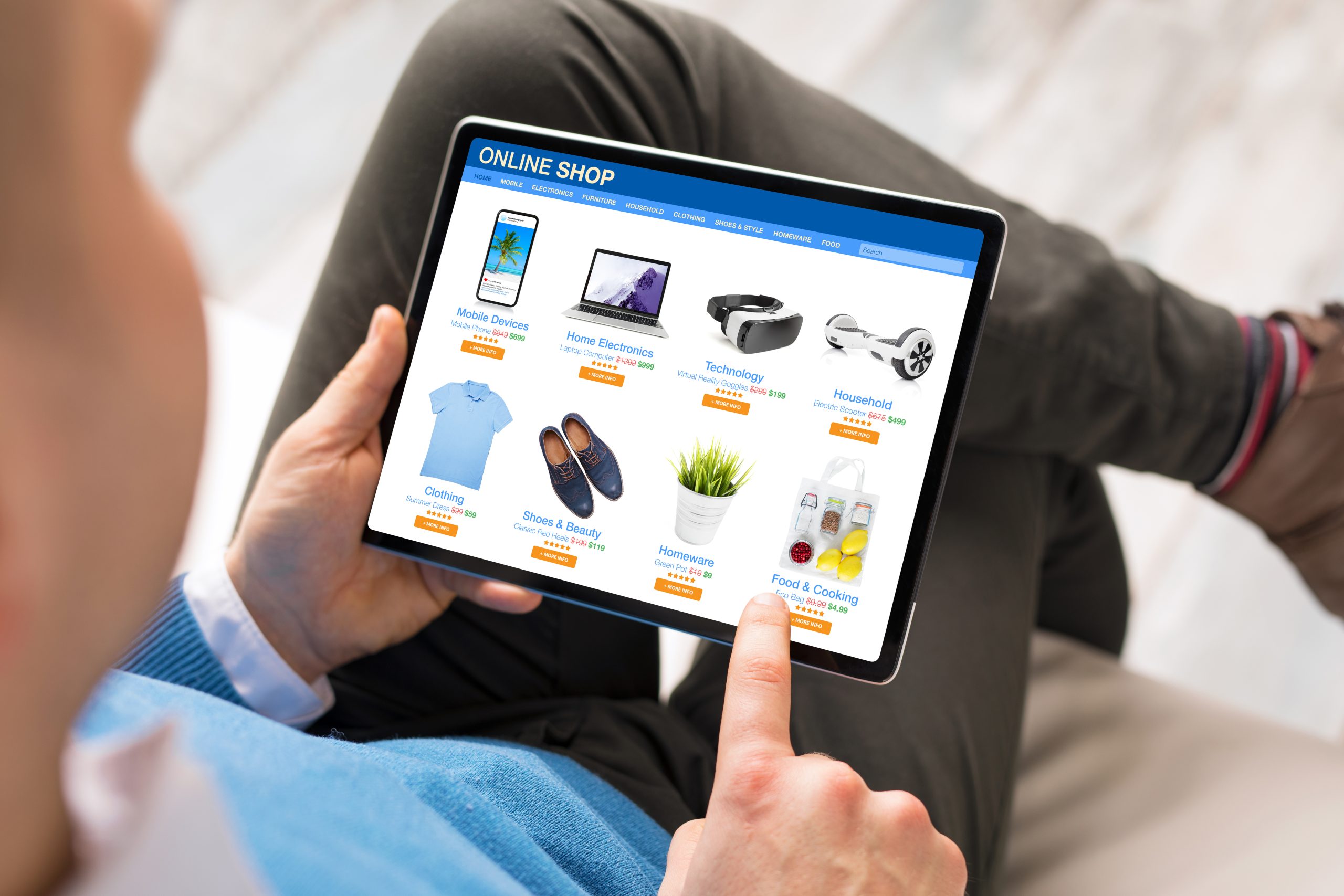 Man shopping at shopify online store on his tablet computer